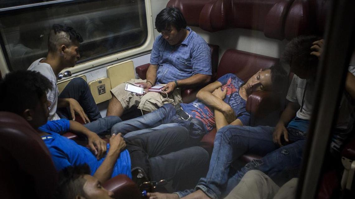 
In this photo taken late Thursday, Aug. 27, 2015, migrants travel on an overnight train from the Macedonian town of Gevgelija, to the border with Serbia. Thousands of migrants have poured into Macedonia and boarded trains and busses that are taking them a step closer to the European Union. 
