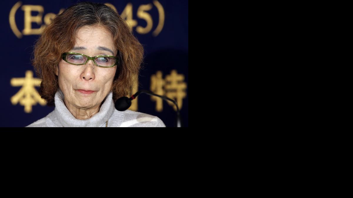 
Junko Ishido, mother of Japanese journalist Keni Goto taken hostage by Islamic State, speaks during a press conference in Tokyo, Friday, Jan. 23, 2015. Goto's mother said her son went to Syria to try to secure a friend's release, corroborating comments by others who said he was trying to rescue Yukawa, who was taken hostage earlier. 
