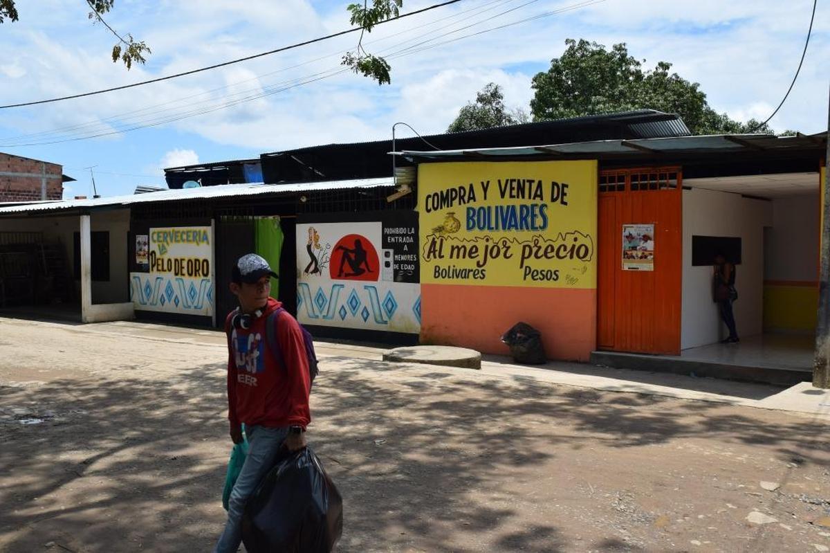 Bars and brothels line the street in Arauca, Colombia. Those who work in the sex industry, say almost all of the prostitutes are from Venezuela — another indication of that country’s deep economic crisis.