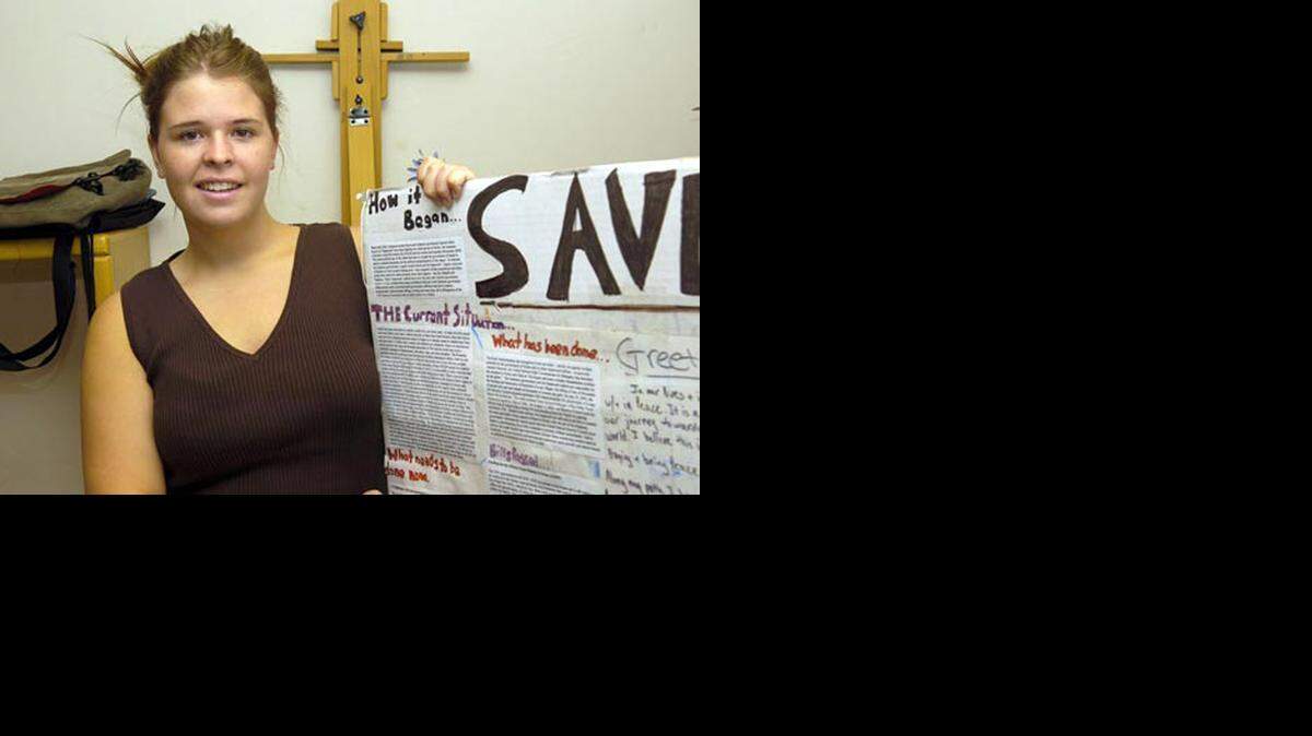 
In this May 30, 2013, photo, Kayla Mueller is shown after speaking to a group in Prescott, Ariz. A statement that appeared on a militant website commonly used by the Islamic State group claimed that Mueller was killed in a Jordanian airstrike on Friday, Feb. 6, 2015, on the outskirts of the northern Syrian city of Raqqa, the militant group's main stronghold. The IS statement could not be independently verified. 
