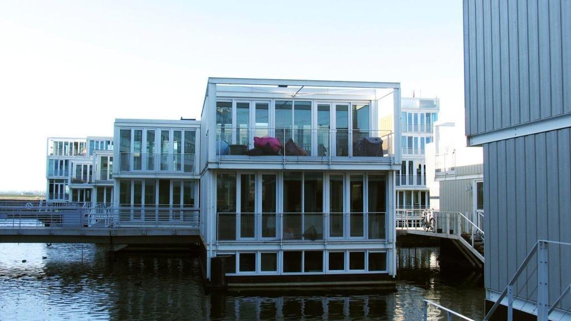 In this photo taken March 28, 2012, amphibious houses are seen in the harbor of the IJburg neighborhood in Amsterdam. IJburg is a new district in the eastern part of town that’s surrounded by water. The Netherlands, a third of which lies below sea level, has been managing water since the Middle Ages and has thus emerged as a pioneer in the field, exporting its expertise to Indonesia, China, Thailand, Dubai and the Republic of the Maldives, an Indian Ocean archipelago that, with a maximum elevation of about 8 feet, is the world's lowest country.