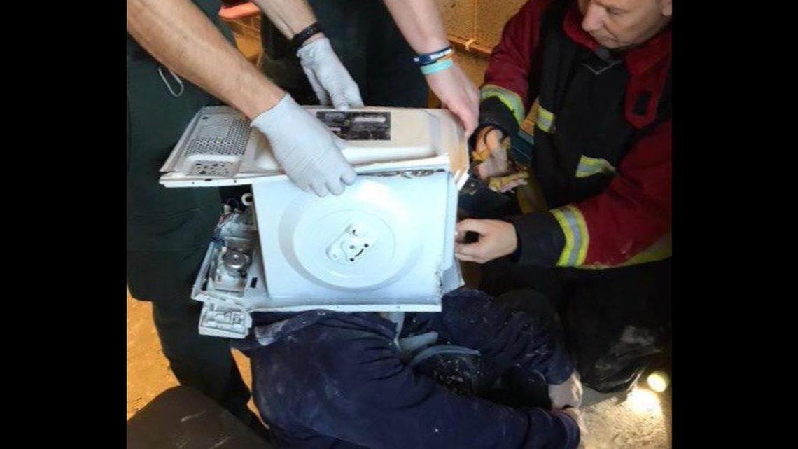 A YouTube prankster had to be rescued in Wolverhampton, England, after cementing a microwave on his head for a video.