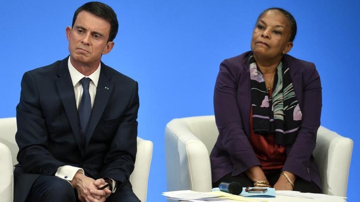 French Prime Minister Manuel Valls, left, and Justice Minister Christiane Taubira are asked a question Wednesday during a press conference at the Elysee palace.