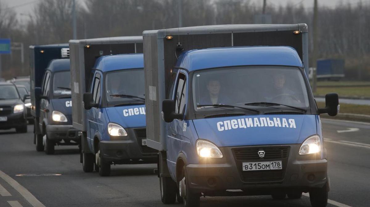 Trucks carry the bodies of the victims from a city morgue to the crematorium for identification in St. Petersburg, Russia, Monday, Nov. 2, 2015. Metrojet's Airbus A321-200 crashed in the Sinai Peninsula on Saturday morning 23 minutes after taking off from Sharm el-Sheikh en route to St. Petersburg. All 224 people on board were killed, the vast majority of them Russians, who are being repatriated to Russia.