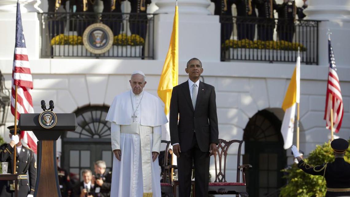 
President Barack Obama and Pope Francis stand at attention during the playing of the national anthems during a state arrival ceremony for the pope, Wednesday, Sept. 23, 2015, on the South Lawn of the White House in Washington.
