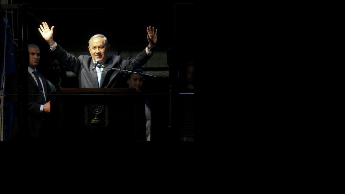 
Israeli Prime Minister Benjamin Netanyahu waves during his election rally in Tel Aviv, Israel, Sunday, March 15, 2015, two days ahead of legislative elections. Netanyahu seeks his fourth term as prime minister. 
