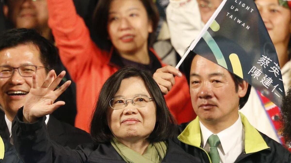 Taiwan's Democratic Progressive Party, DPP, new president Tsai Ing-wen waves as she celebrates winning the election Jan. 16, 2016, in Taipei, Taiwan.