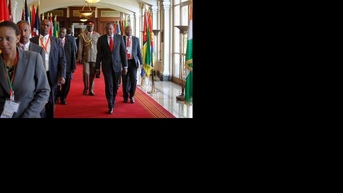 
Kenya's President Uhuru Kenyatta, center foreground, arrives for the Intergovernmental Authority on Development (IGAD) summit, held on the eve of the heads of state meeting of the African Union summit, in Addis Ababa, Ethiopia, Thursday, Jan. 29, 2015. The threat posed by Boko Haram, Nigeria's Islamic extremist rebels, will be a focus of U.N. Secretary-General Ban Ki-moon as he attends the African Union heads of state summit in Addis Ababa, Ethiopia, a spokesman said. 
