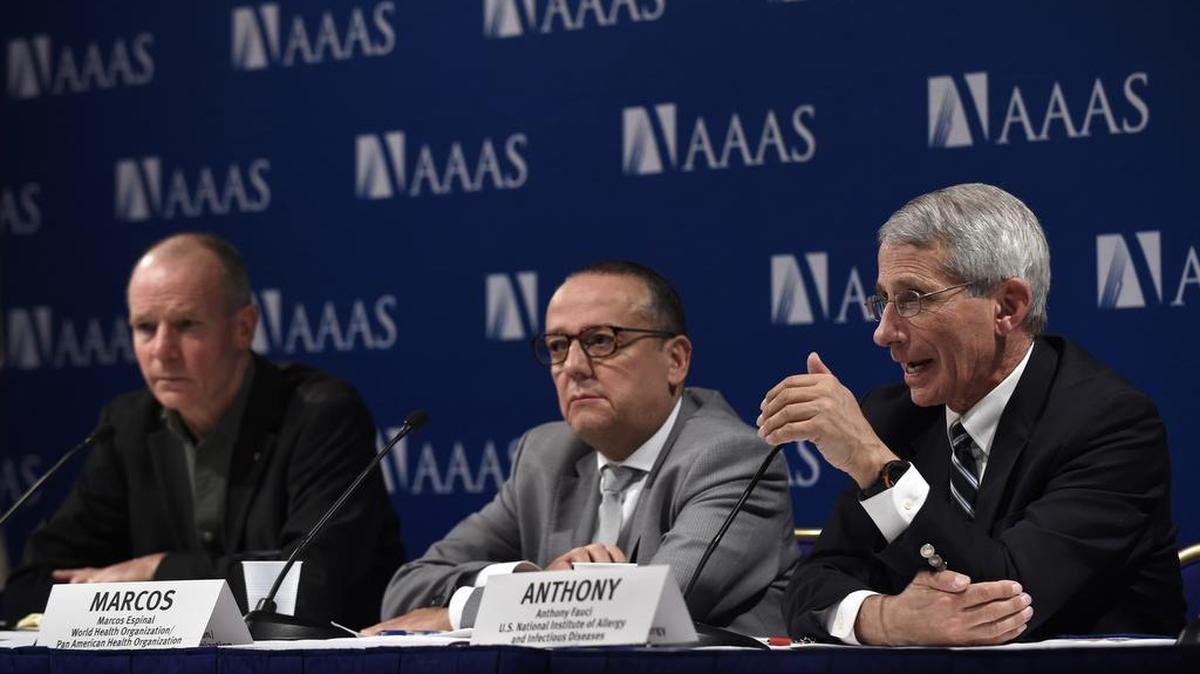 Dr. Anthony Fauci, right, director of the National Institutes for Allergy and Infectious Diseases, discusses the Zika virus with Christopher Dye, left, and Marcos Esponal of the World Health Organization at the American Association for the Advancement of Sciences meeting on Friday, Feb. 12, 2016, in Washington.