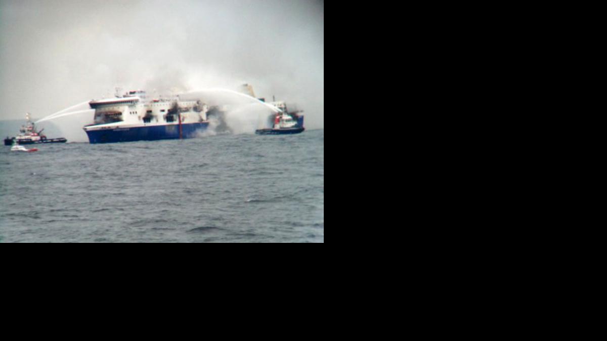 
In this photo taken from a nearby ship, vessels try to extinguish the fire at the Italian-flagged Norman Atlantic after it caught fire in the Adriatic Sea, Sunday, Dec. 28, 2014. Italian and Greek military and coast guard rescue crews battled gale-force winds and massive waves Sunday as they struggled to rescue hundreds of people trapped on a burning ferry adrift between Italy and Albania. 
