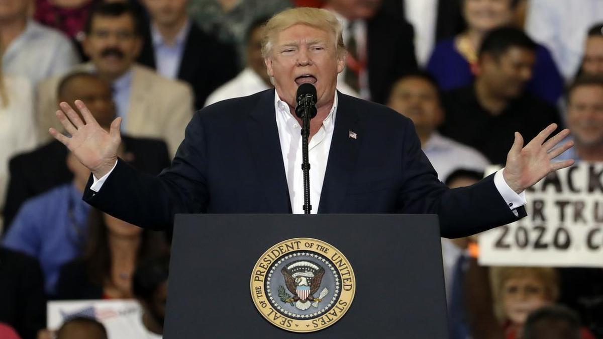 President Donald Trump speaks to the crowd during a rally at Orlando-Melbourne International Airport Saturday, Feb. 18, 2017, in Melbourne, Fla.