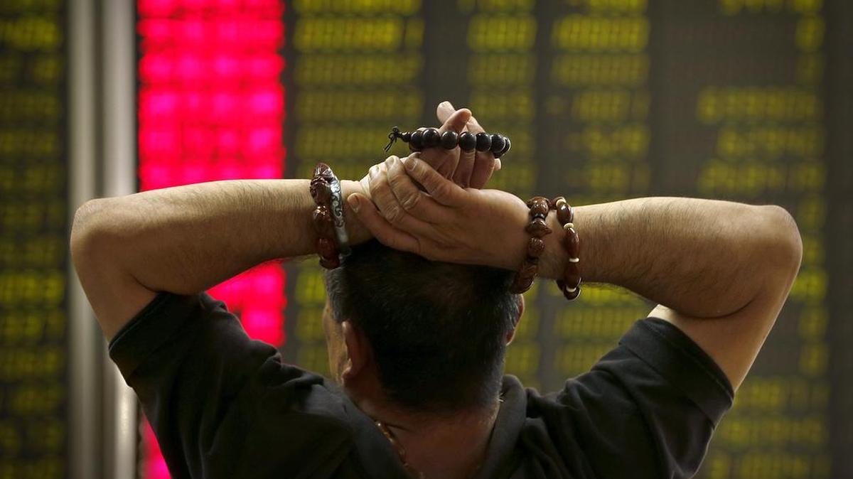 
A Chinese investor monitors stock prices at a brokerage house in Beijing, Monday, Aug. 24, 2015. Stocks tumbled across Asia on Monday as investors shaken by the sell-off last week on Wall Street unloaded shares in practically every sector. 
