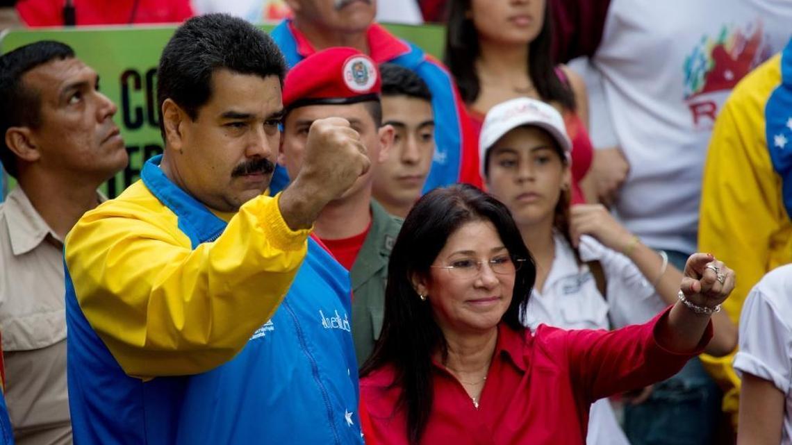 Venezuela's President Nicolas Maduro and first lady Cilia Flores at a march in Caracas, Venezuela. Two Flores nephews are accused of conspiring to smuggle 800 kilograms of cocaine into the U.S.