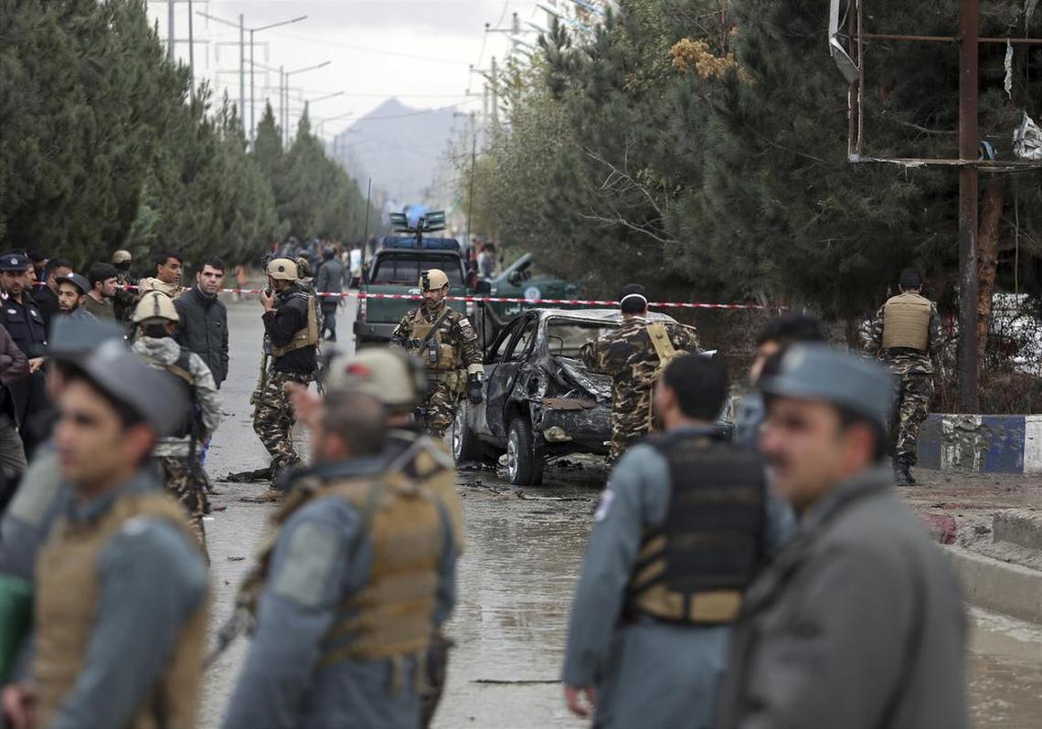 Afghan security personnel arrive at a deadly suicide bombing, in Kabul, Afghanistan, Thursday, Nov. 16, 2017. The Interior Ministry spokesman says the attacker detonated his payload at the entrance to a wedding hall where the event was being held.