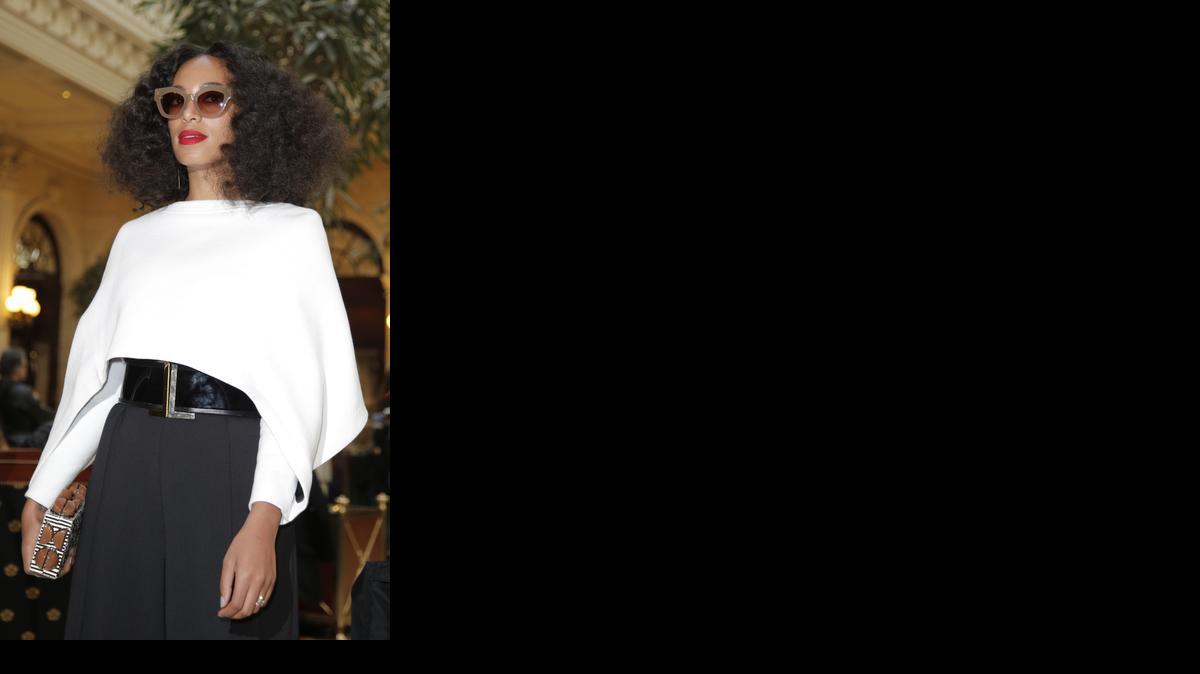 
U.S singer Solange Knowles arrives – later than fashionably late – at Balmain’s ready-to-wear Fall-Winter 2015/2016 fashion collection, part of the Paris Fashion Week, Thursday March 5, 2015, in Paris, France. Beyonce’s cooler, younger sister was immediately forgiven for her tardy entry into Carven’s show – rocking a wild, trendy weave with center parting. 
