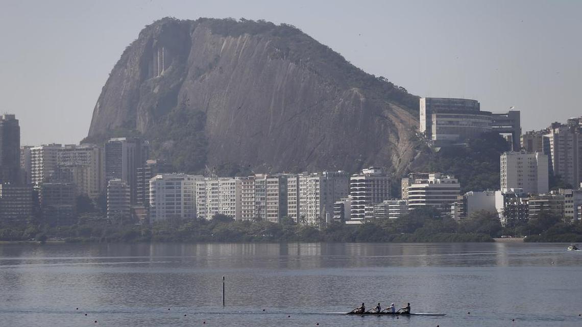 
Rowers practice on Rodrigo de Freitas lake in Rio de Janeiro, Brazil, Aug. 4, 2015. The head of the governing body of world rowing says he will ask for viral testing at the rowing venue for next year's Rio Olympics, and says he expects all other water sports in Rio to follow suit. The move comes after an Associated Press investigation last week showed a serious health risk to Olympic athletes who will compete at water venues around Rio that are rife with human waste and sewage.
