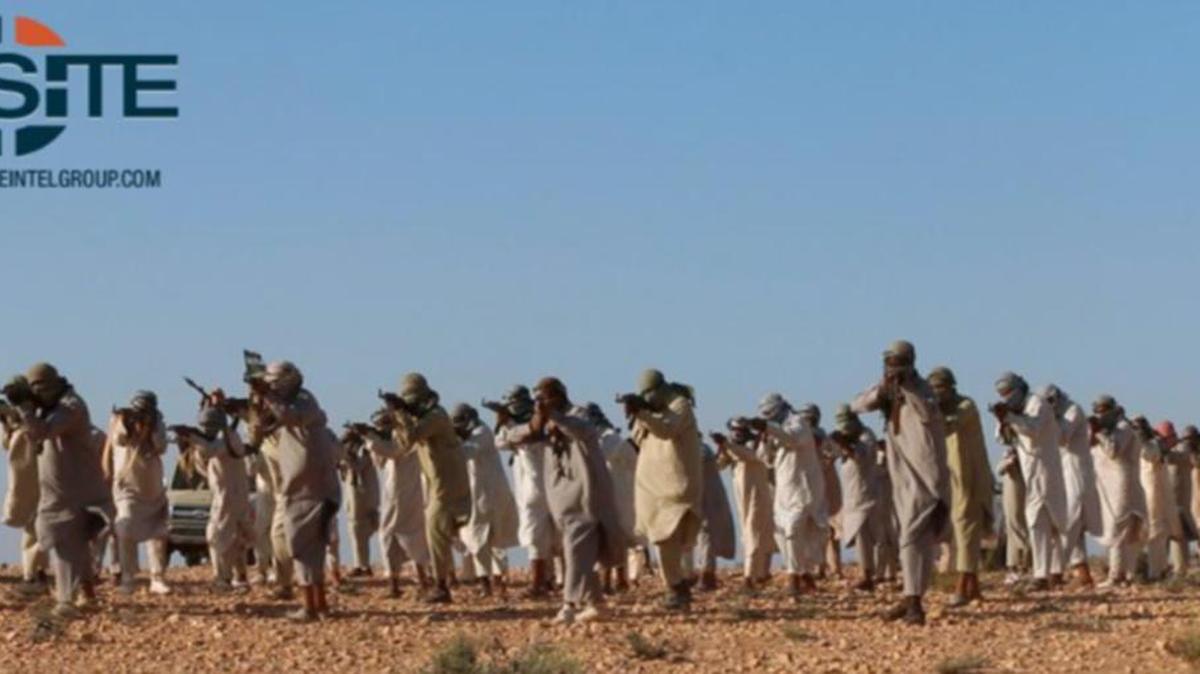 This image posted online February 5, 2016 by supporters of the Tripoli Province of the Islamic State in Libya on a social media site, and vetted by SITE Intel Group shows fighters training at a camp in Libya. American warplanes struck multiple targets in Libya overnight, hitting what was apparently an Islamic State training camp and a senior extremist leader, a U.S. official said Friday, Feb. 19, 2016.