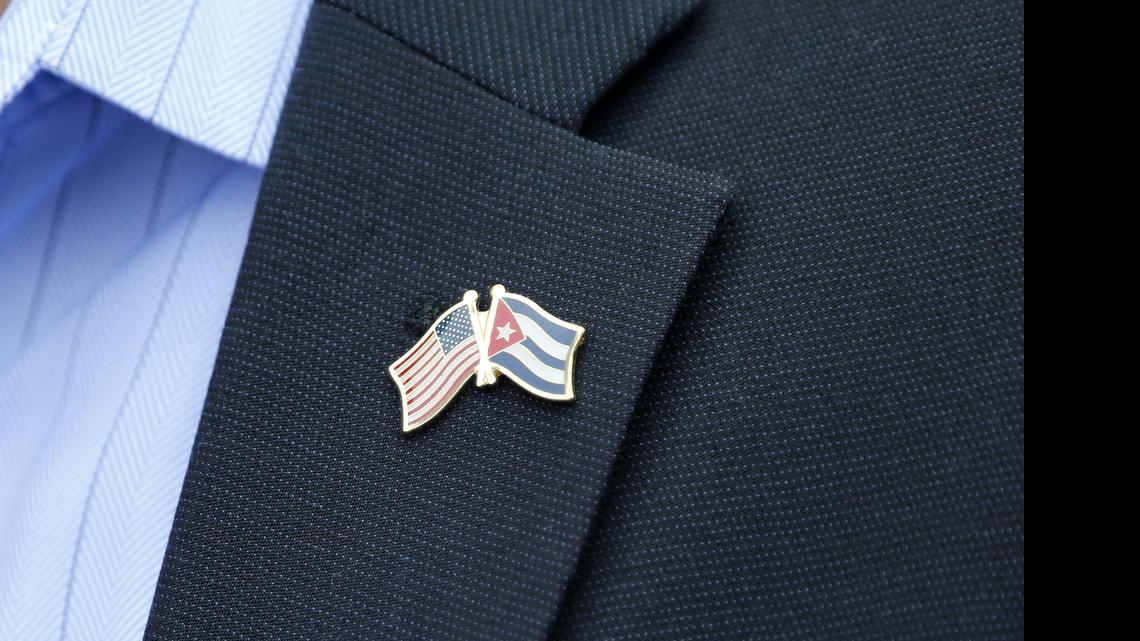 
A flag pin worn by a member of a U.S. Senate delegation in Havana, Cuba, represents the two countries moving toward normalizing relations. Much work remains to be done. Embassies are to be reopened July 20.
