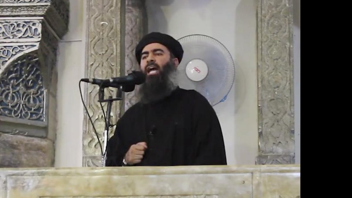 
Abu Bakr al Baghdadi, the leader of the Islamic State group shown in July 5, 2014, has apparently made a new audio recording to prove that he is not incapacitated by injuries from coalition airstrikes. In the recording released Thursday, May 15, 2015, on the Internet, he called on all Muslims to join the caliphate he leads in Iraq and Syria. “There is no excuse for any Muslim not to migrate to the Islamic State,” he said. “Joining is a duty on every Muslim.”
