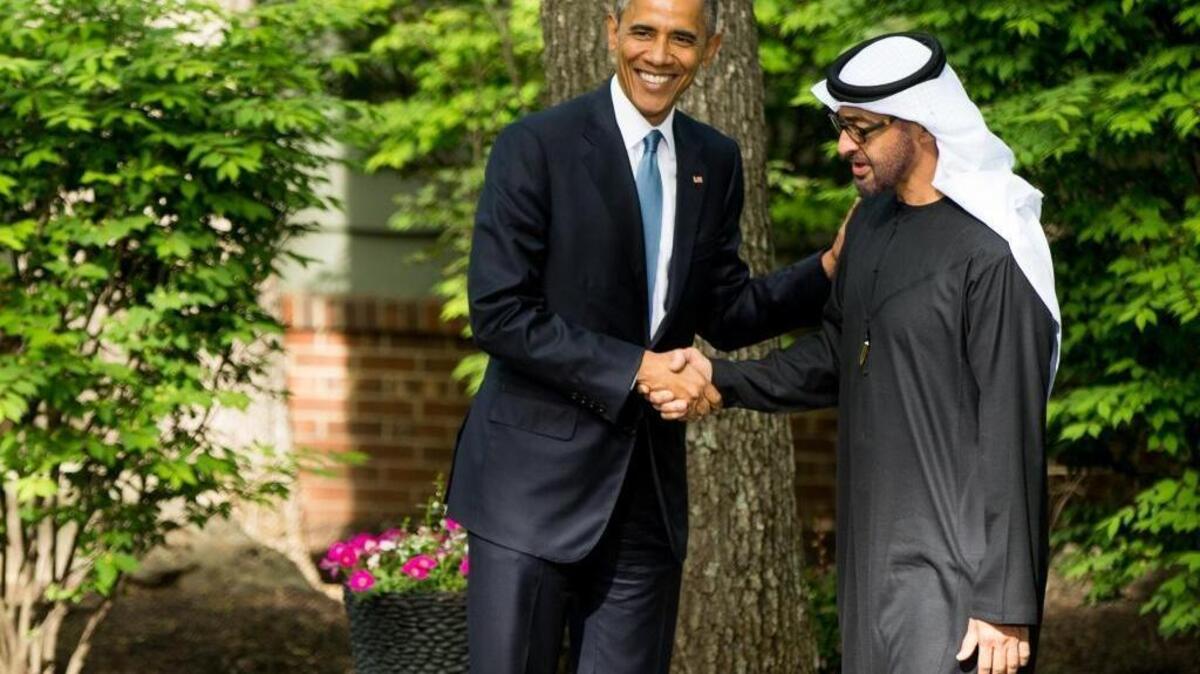 President Barack Obama shakes hands with Abu Dhabi crown prince Sheikh Mohammed bin Zayed Al Nahyan after meeting with Gulf Cooperation Council leaders at Camp David in Maryland, Thursday, May 14, 2015.