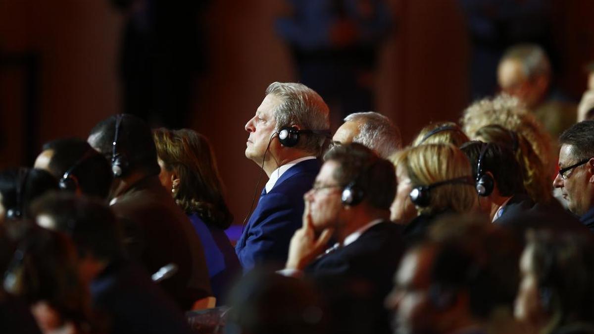 Environmental activist and former U.S. Vice President Al Gore listens during the final conference at the COP21, the United Nations conference on climate change, in Le Bourget, north of Paris, Saturday, Dec.12, 2015. France crafted an unprecedented deal to slow global warming by cutting and then eliminating greenhouse gas pollution, urging climate negotiators from nearly 200 nations to adopt it Saturday.