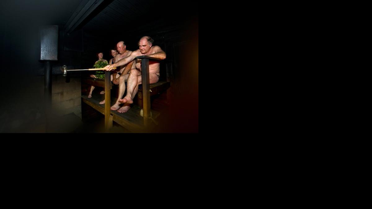 
People sit in a sauna at a summer cottage in Leppavirta, central Finland, July 18, 2012. Frequent sauna baths may help you live longer, a study of Finnish men suggests. 
