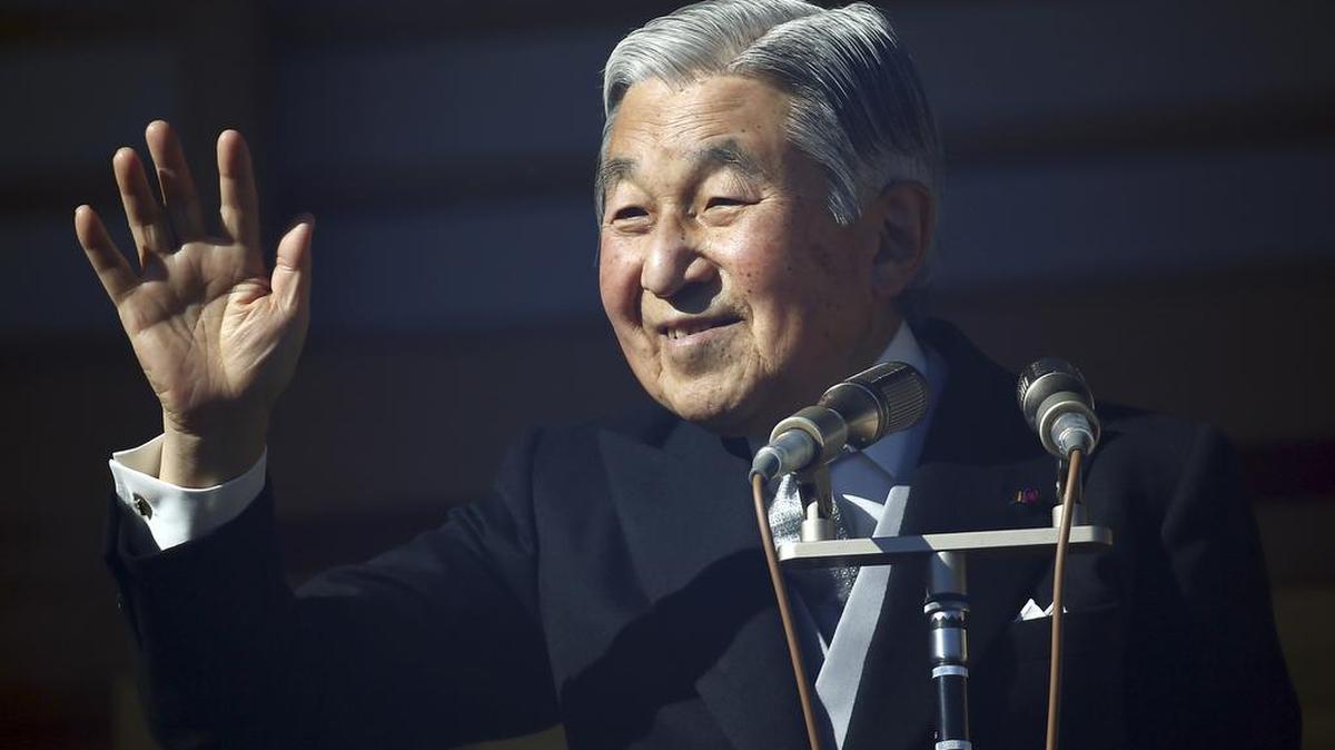 Japan's Emperor Akihito waves to well-wishers as he and family members appear on the balcony of the Imperial Palace during the emperor’s 81st birthday in Tokyo in 2014. Japan will tune in to Emperor Akihito’s rare video message Monday, Aug. 8, 2016 following reports that he would abdicate in the next few years, which initially came as shock but which many people appeared to have welcomed as a deserved rest for the 82-year-old beloved monarch.