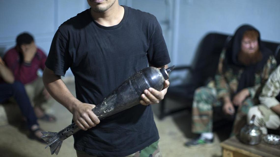 A makeshift mortar round at a rebel workshop in Saraqib, Syria, in 2013. Rebels entrenched in an eastern suburb of Damascus fired volleys of mortar shells into the Syrian capital on Sunday, killing three people, including a child, and wounding 33, Syria’s state-run news agency and residents said. Government forces hit back with airstrikes that activists said killed at least 28 people.