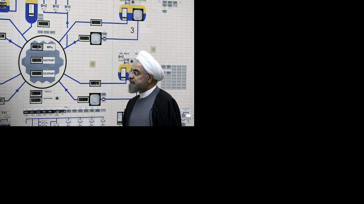 
In this photo released by the Iranian Presidency Office, President Hassan Rouhani visits the Bushehr nuclear power plant just outside the port city of Bushehr, southern Iran, Jan. 13, 2015. Rouhani on April 3, 2015, pledged that his nation will abide by its commitments in the nuclear agreement reached the previous day in Switzerland. He called the framework a “first step” toward “constructive interaction” with the international community, and he indicated that he wanted improved relations with the United States.
