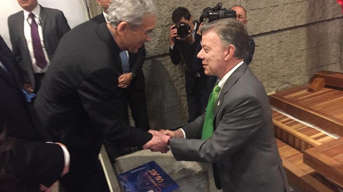 Colombian President Juan Manuel Santos (right) at a peace forum at Bogota’s Javeriana University, April 21, 2017. Santos said one of the most difficult aspects of the peace process was being called a traitor.