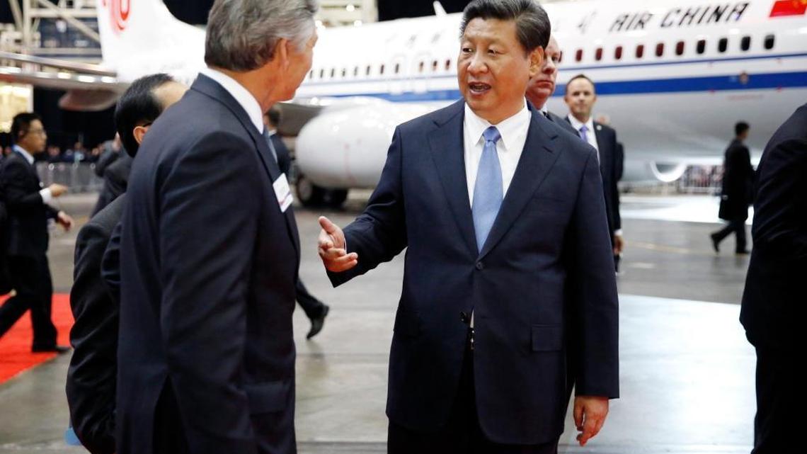 Chinese President Xi Jinping, right, and the president and CEO of Boeing Commercial Airplanes, Ray Conner, tour the Boeing assembly line on Sept. 23, 2015, in Everett, Wash.