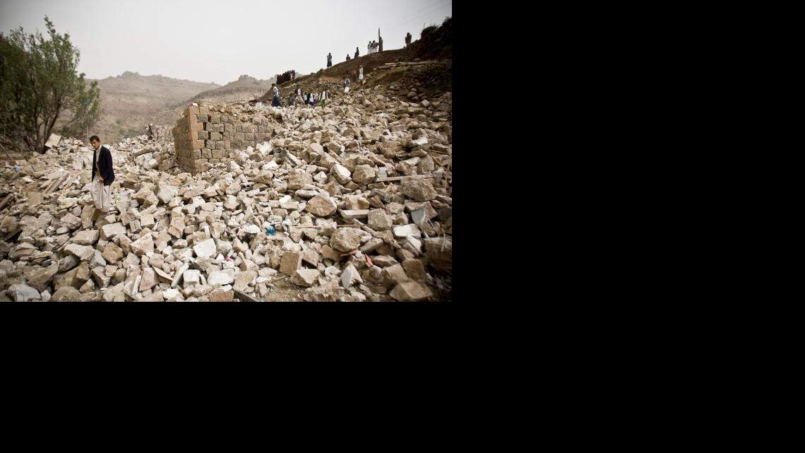 
Yemenis search for survivors in the rubble of houses destroyed by Saudi-led airstrikes in a village near Sanaa, Yemen, April 4, 2015. Saudi Arabia is leading a coalition trying to drive the rebels out of Yemen.
