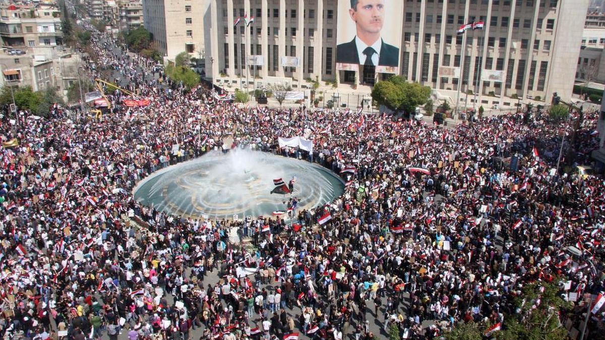 Thousands of Syrians rally in support of President Bashar Assad in Damascus, Syria, on March 29, 2011 as he faces the biggest challenge to his rule.