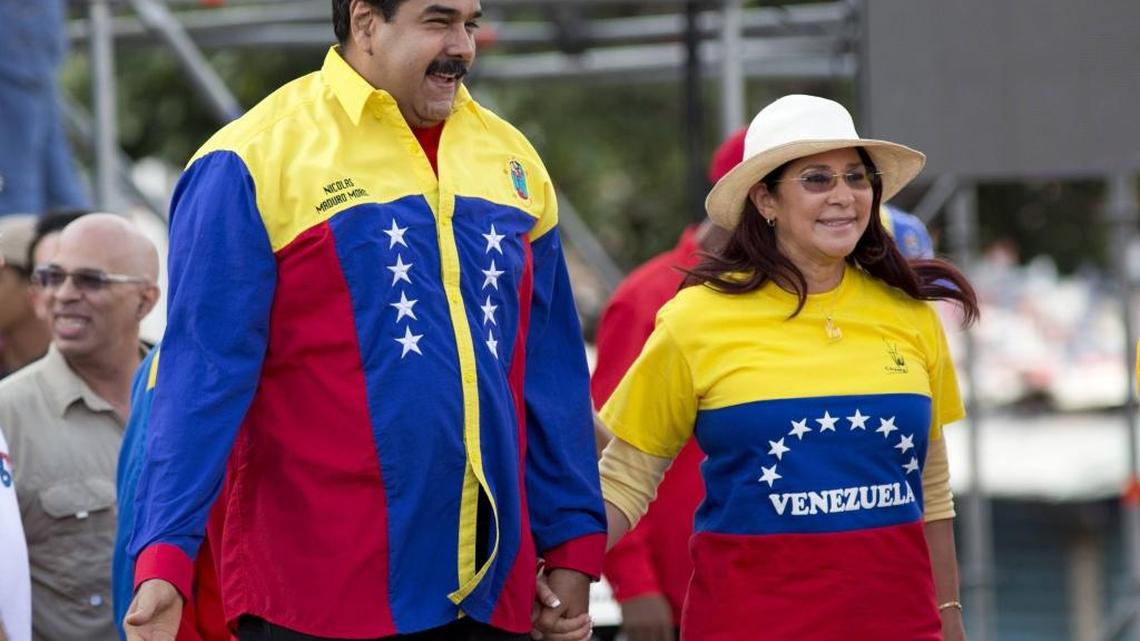 Venezuela's President Nicolas Maduro and first lady Cilia Flores during the closing campaign rally in Caracas, Venezuela, Dec. 3, 2015. Two of Flores nephews go on trial Monday for conspiring to smuggle hundreds of kilos of cocaine into the United States