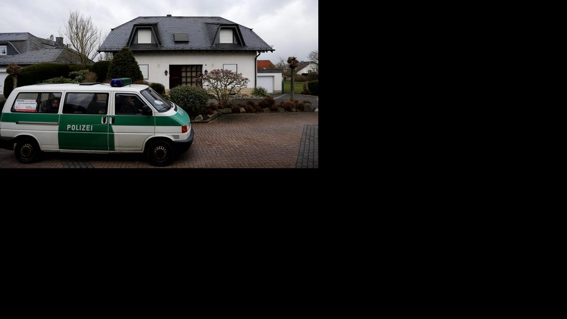 
A police car waits in front of the house of the family of Andreas Lubitz in Montabaur, Germany, Friday, March 27, 2015. 
