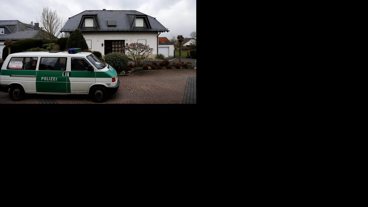 
A police car waits in front of the house of the family of Andreas Lubitz in Montabaur, Germany, Friday, March 27, 2015. 
