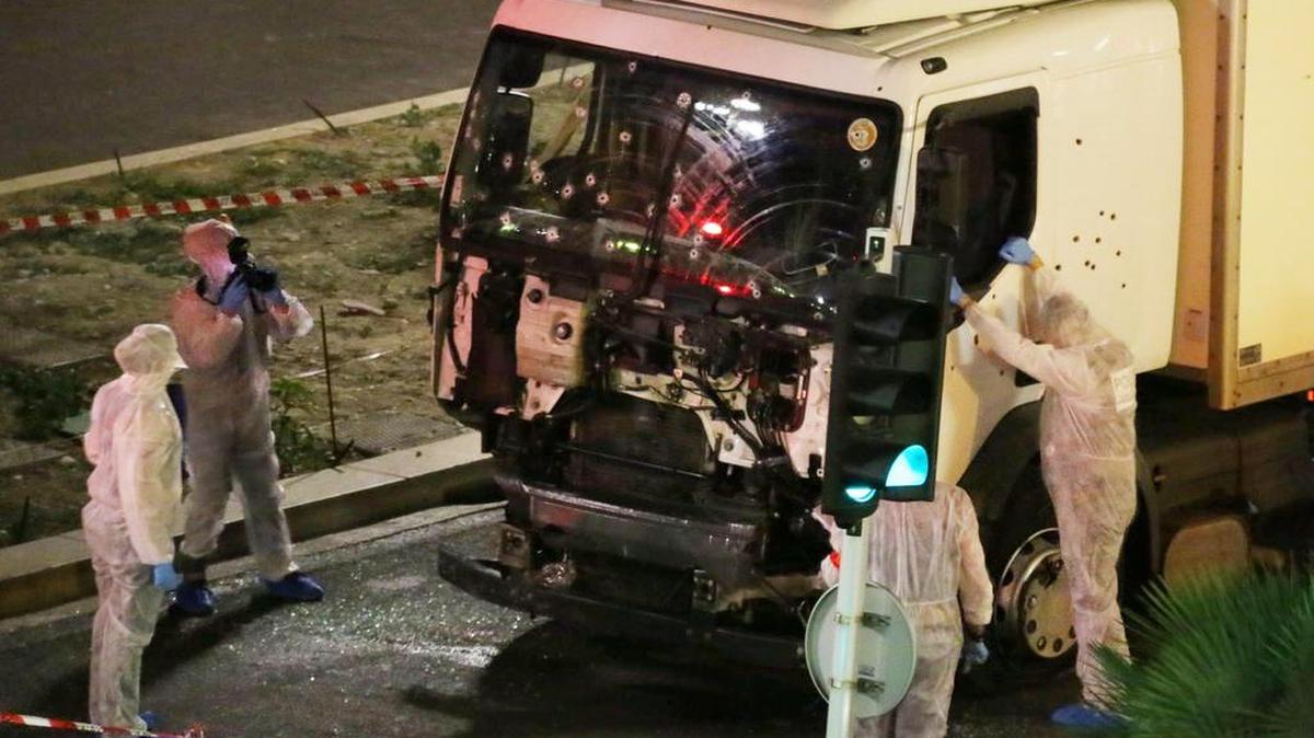 Authorities investigate the truck driven by Mohamed Lahouaiej Bouhlel, 31, after it plowed through Bastille Day revelers in the French resort city of Nice, France on Thursday. Bouhlel, who was born in Tunisia, was a French national, a similar characteristic with other terrorists implicated in the three recent mass killings in France.