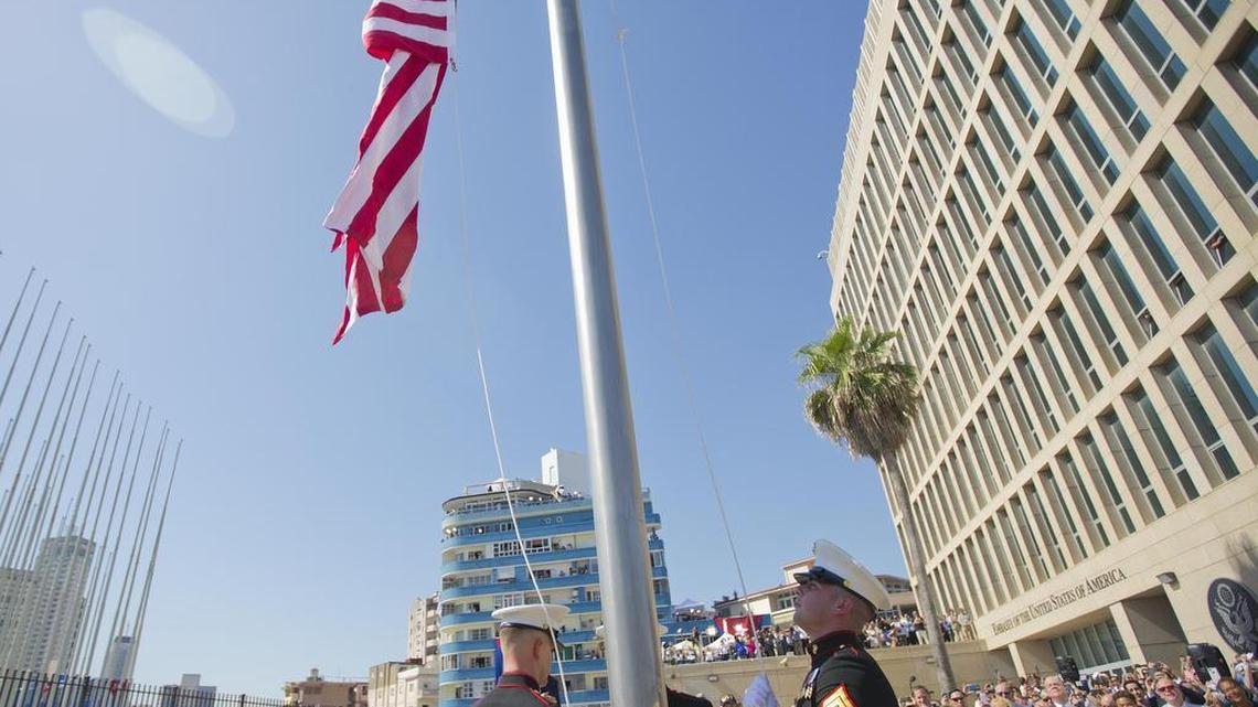 
U.S. Marines raise the U.S. flag over the newly reopened embassy in Havana, Cuba. Friday, Aug. 14, 2015. U.S. Secretary of State John Kerry traveled to the Cuban capital to raise the U.S. flag and formally reopen the long-closed U.S. Embassy. Cuba and U.S. officially restored diplomatic relations July 20, as part of efforts to normalize ties between the former Cold War foes.
