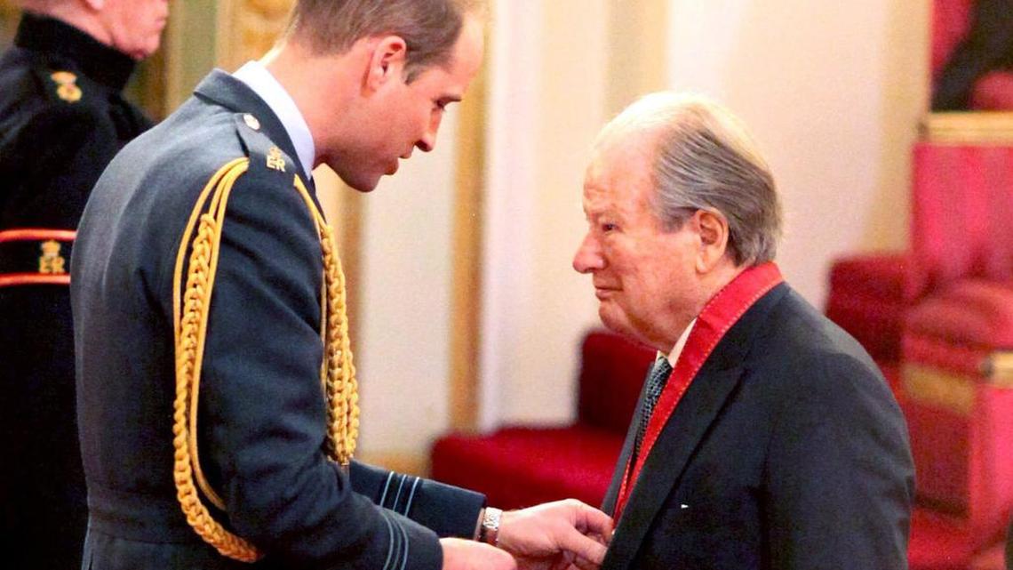 Musician Neville Marriner is made a Companion of Honour by Britain’s Prince William at Buckingham Palace in London on March 15, 2016. The Academy of St Martin in the Fields orchestra says its founder, conductor Neville Marriner, has died. He was 92.