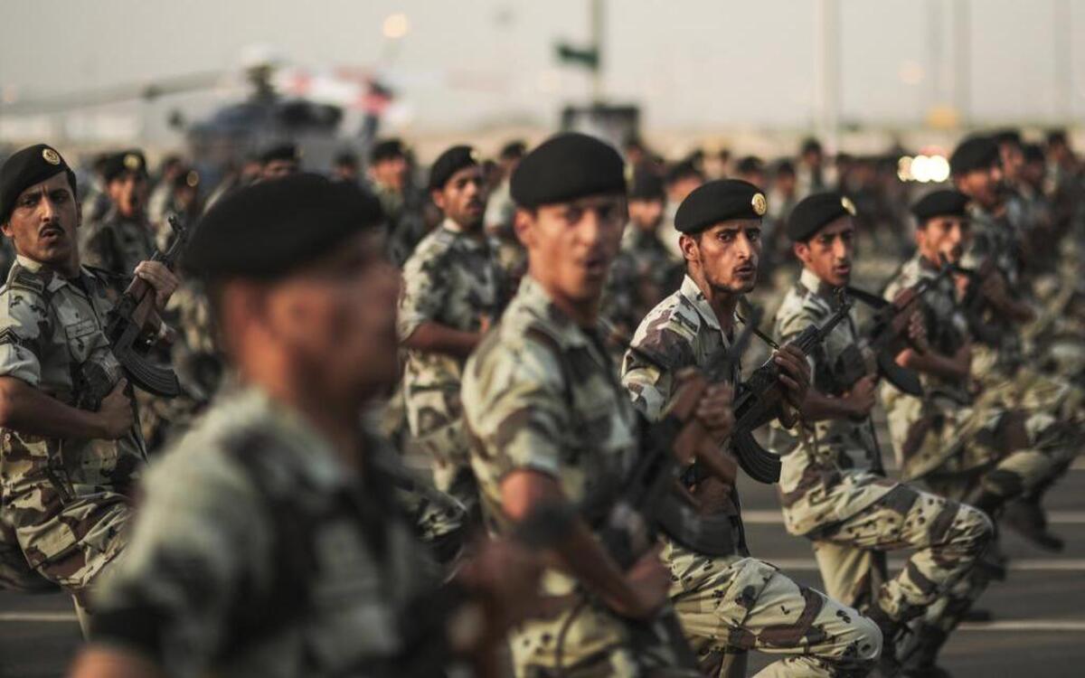 In this Thursday, Sept. 17, 2015 file photo, Saudi security forces take part in a military parade in preparation for the annual Hajj pilgrimage in Mecca, Saudi Arabia. Saudi Arabia said Tuesday, Dec. 15, 2015 that 34 nations have agreed to form a new "Islamic military alliance" to fight terrorism with a joint operations center based in the kingdom's capital, Riyadh.