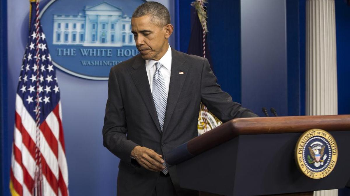 President Barack Obama walks from the podium after speaking about attacks in Paris from the briefing room of the White House, on Friday, Nov. 13, 2015, in Washington. Obama is calling the attacks on Paris an "outrageous attempt to terrorize innocent civilians" and vows to do whatever it takes to help bring the perpetrators to justice.
