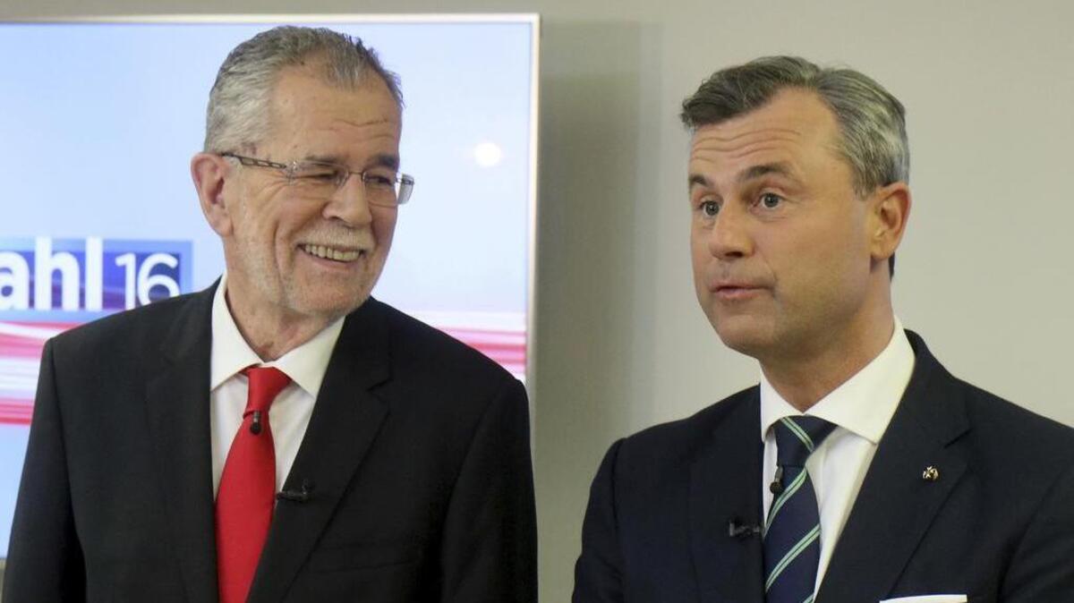 Alexander Van der Bellen, candidate of the Austrian Greens, and Norbert Hofer of Austria’s Freedom Party, FPOE, from left, wait for the start of a TV debate in Vienna, Austria, Thursday, Dec. 1, 2016. Austria holds presidential elections on Sunday in a contest pitting a left-leaning contender against a right-winger supported by a populist anti-immigration party.