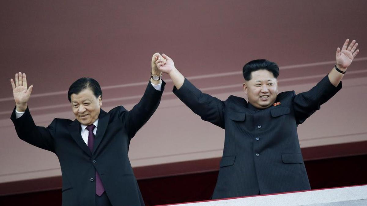North Korean leader Kim Jong Un, right, and visiting Chinese official Liu Yunshan, the Communist Party’s fifth-ranking leader, watch a parade in Pyongyang, North Korea, in October 2015.