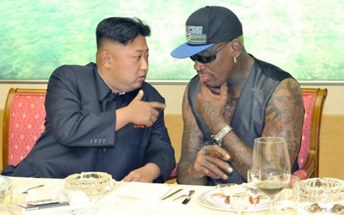 North Korean leader Kim Jong Un, left, talks with former NBA player Dennis Rodman during a 2013 dinner in North Korea.