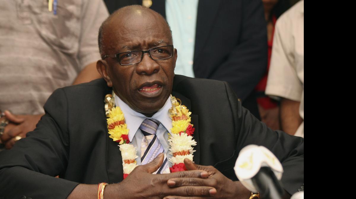 
FIFA executive Jack Warner gestures during a news conference held shortly after his arrival at the airport in Port-of-Spain, in his native Trinidad and Tobago. Warner was one of the 14 people indicted Wednesday in the U.S. on corruption charges.
