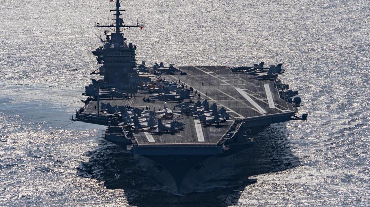 In this photo released by the U.S. Navy, the aircraft carrier USS Harry S. Truman navigates the Gulf of Oman on Dec. 25, 2015. Iranian naval vessels conducted rocket tests last week near the carrier, the USS Bulkeley destroyer and a French frigate, the FS Provence, and commercial traffic passing through the Strait of Hormuz, the American military said Dec. 30, 2015.