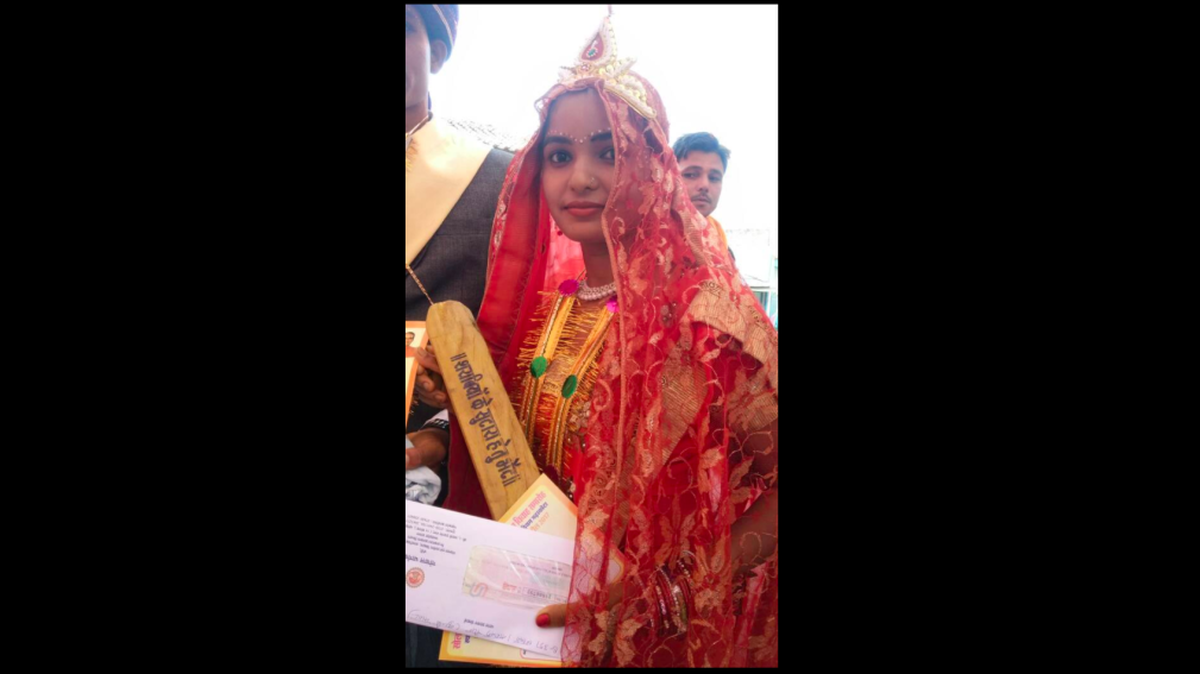 Gopal Bhargava, a state minister in Madhya Pradesh, India, posted a photo of a bride on Facebook carrying one of the bats meant to ward off drunk or abusive spouses.