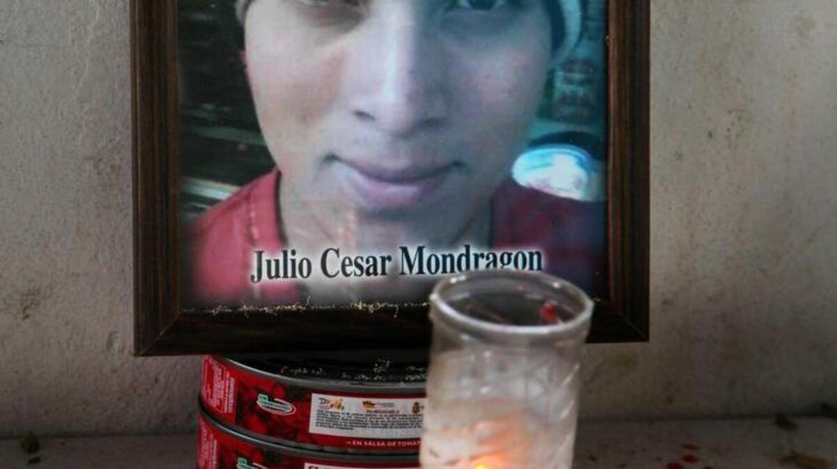 An altar for slain student Julio Cesar Mondragon stands at his former school, the Raul Isidro Burgos Rural Normal School of Ayotzinapa, in Tixtla, Mexico, on Sunday, Nov. 9, 2014.
