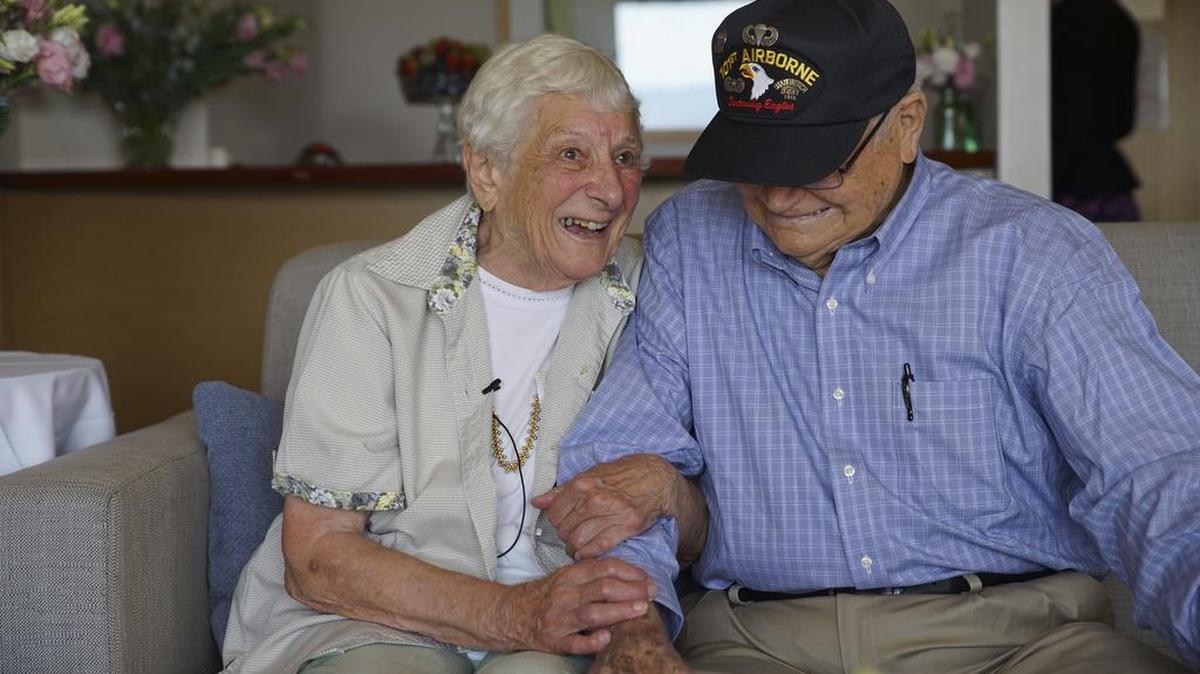 World War II veteran Norwood Thomas, 93, from the U.S., reunites with his wartime girlfriend Joyce Morris of Australia, in Adelaide, Australia, on Wednesday, Feb. 10, 2016, after more than 70 years apart.