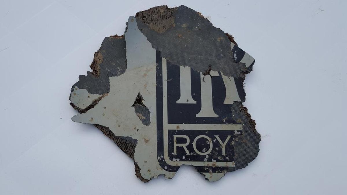 A part of a plane is photographed in Mossel Bay, near Cape Town, South Africa, on March 21, 2016. The part which may be from a plane engine has been found on the southern coast of South Africa and will be checked to see if it belongs to Malaysia Airlines Flight 370, which vanished two years ago, Malaysian Tranport Minister Liow Tiong Lai said March 22, 2016.